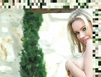 Gorgeous Katie Carroll strips topless outdoors