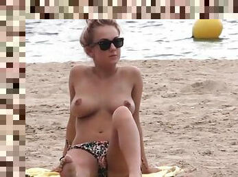 Beach babe with amazing big natural tits