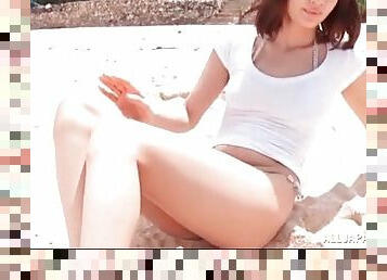 Beautiful Japanese bikini babe on the beach