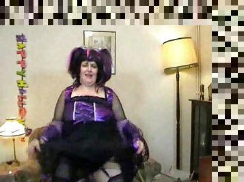 Fat chick dressed as witch and dancing