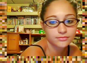 Babe in cute glasses is fucking on the webcam