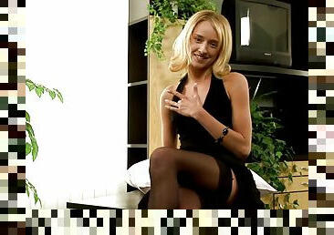 Horny blonde in stockings dildoes her pussy at the office