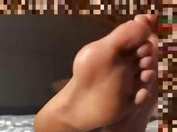 Ebony Rubs Her Feet Together