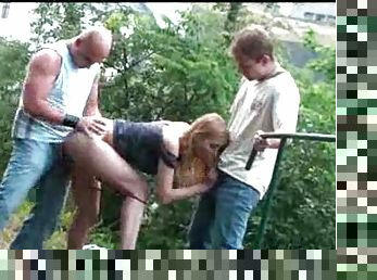 Girl fucked by two guys in public