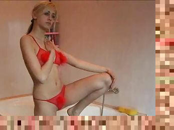 Blonde Russian chick posing in the shower