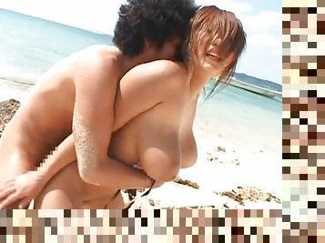 Naturally Busty Japanese Gets Fucked in a Threesome on the Beach