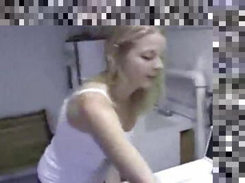 Hot blonde teen GF posing for the camera in laundry room