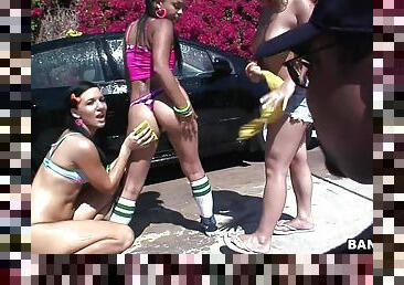 Nasty girls tout all the guys to their sexy car wash