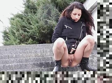 Cute girl squats and pees in public