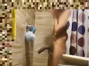 Hot shower and showing the big hanging cock