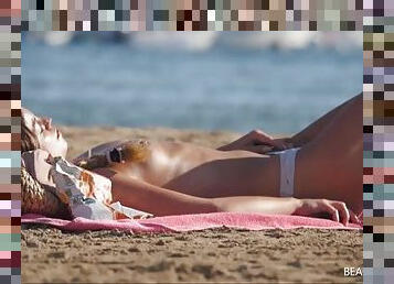 Amateur tits exposed as ladies hang out on the beach