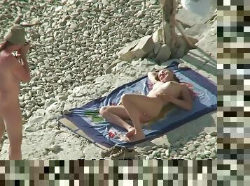 Horny Couple Shares Intimate Moments At Nudist Beach