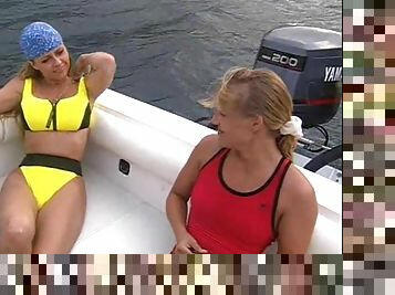 Babes on a boat have a blast while fucking each other's bodies