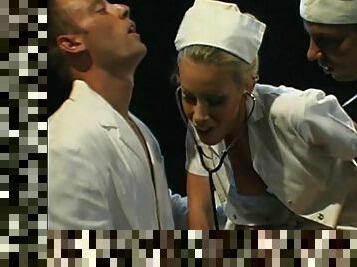 Sexy nurse has a blast while being penetrated by two cocks