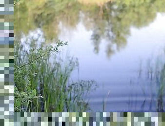 Swimming in lake in clothes. Black Wet skirt, wet stockings and tank top. Wetlook transgirl in lake.