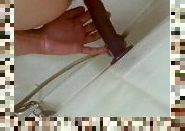 Handsome guy fucks his ass with big dildo in shower
