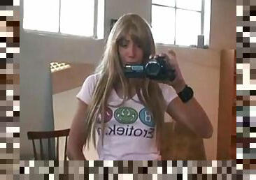 Girl with video camera play her pussy