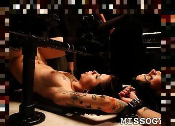 Tattooed submissive girls bound by their mistress