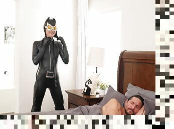 Bitch in sexy leather costume is keen to wake up her man for some good fucking