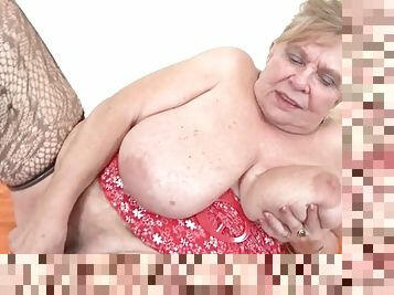 Fat grandma with huge tits fucks a toy
