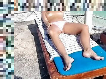 I'm sunbathing my tits on a deckchair