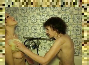 Wrinkled granny and tight teen take a bath