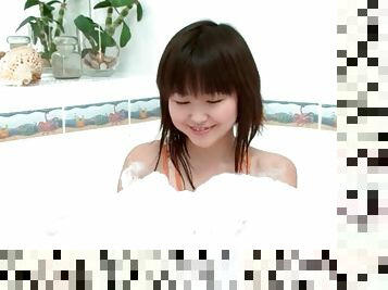 Skinny Asian girl Aliona takes a bath