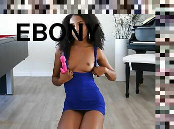 Foxy ebony girl Olivia drops on the floor to show her toy collection