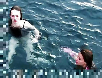 Two sexy babes get taped diving in the ocean while being naked
