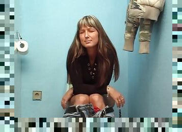Tattooed miss giving a thrilling handjob in the toilet