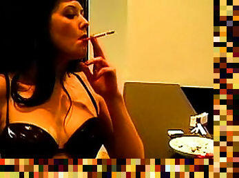 Dark-haired nurse smoking hot in her apartment