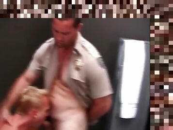 Horny cops in the locker room suck cock