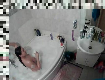 Amateur brunette in bathtub voyeur video