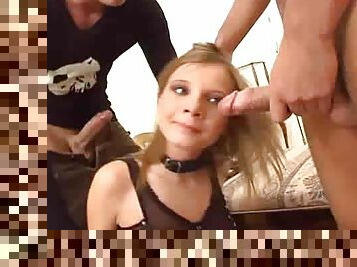 Collared teen slave sucks two dicks