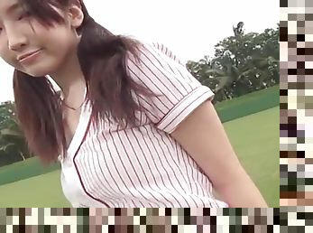 Young and sporty Japanese girl on the field