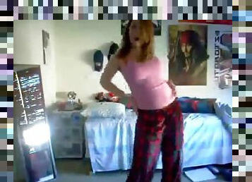 Redhead dances in her pajamas