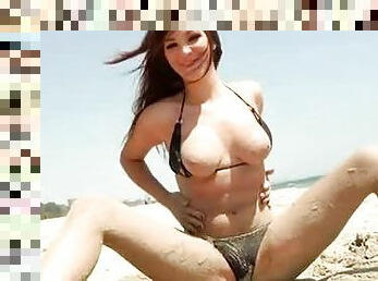 Perfect girl in a bikini on the beach