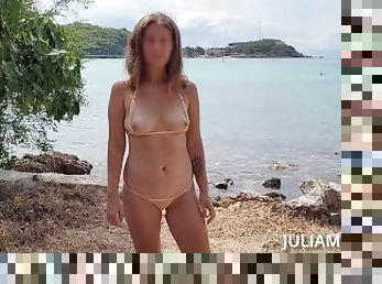 Transparent micro bikini on public beach