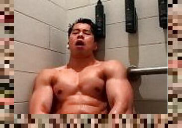 Muscle Asian cums in locker room shower