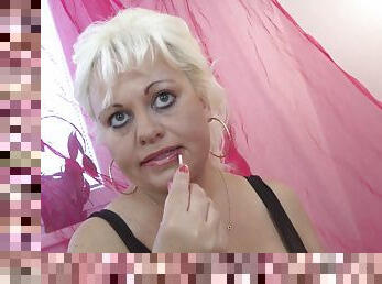 Mature blonde chick puts on some makeup and decides to masturbate