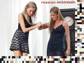 Irina and her best friend are stepping all over the slave's body