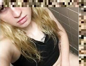 Slim blonde tgirl shows herself in public bathroom