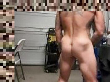 Tattooed, muscular and very Freaky Hispanic Father jerks it in his garage.