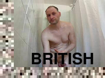 A man washes himself in the shower and then shaves his body, balls, armpits, legs and anus