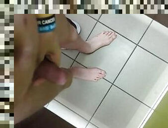 Fully naked and masturbating in public toilet