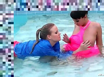 Lesbians fool around in the pool and get horny