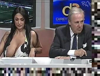 Huge tits girl on Italian news program