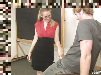 Quicke blowjob in the classroom with a mature blonde teacher