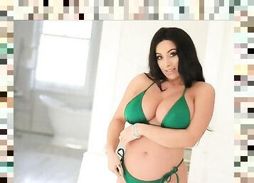 All natural Brit babe Fiona Siciliano slides down her green tiny bikini