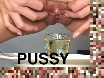 Dominika C dips her pussy in oil